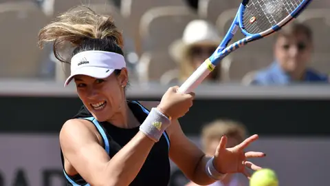 Garbiñe Muguruza ejecuta un drive ante Taylor Townsend Garbiñe Muguruza ejecuta un drive ante Taylor Townsend