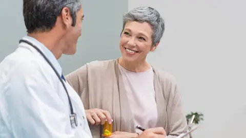Una mujer en la consulta para hablar de la menopausia Una mujer en la consulta para hablar de la menopausia
