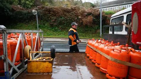 Un repartidor de bombonas de butano Un repartidor de bombonas de butano